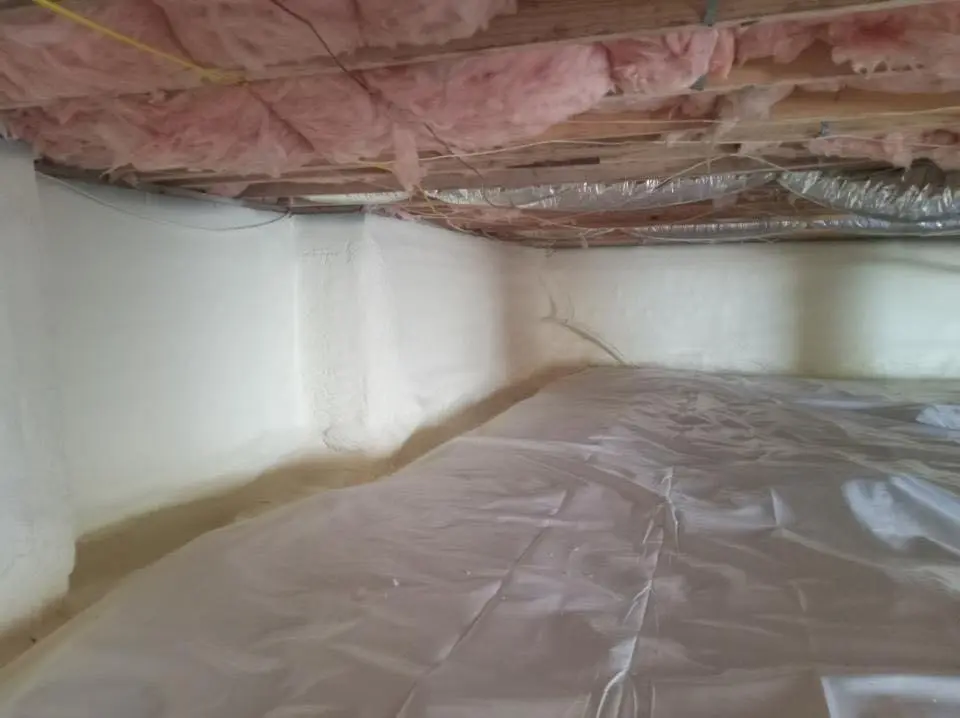 Crawl space encapsulation with closed-cell spray foam for Commercial Roof Restoration in Redan